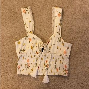 White crop top with flowers and tie in the front